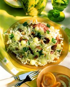 Chinese cabbage salad with duck breast, melon and peanuts