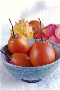 Tamarillos in blue bowl