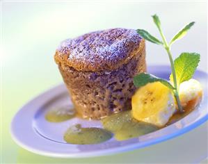 Chocolate soufflé with bananas and mint sauce