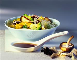 Broccoli soup with glass noodles and marinated chicken