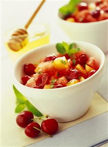 Melon and cherry salad with honey