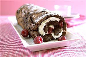 Chocolate roll with raspberries