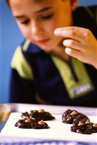 Small boy making chocolate biscuits (2)