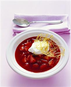 Cold strawberry soup with snow dumpling and spun sugar