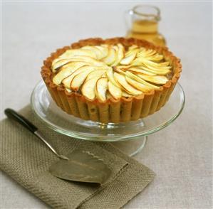 Apple tart on cake plate