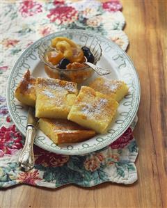 Semolina slices with dried fruit compote