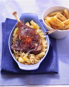 Goose leg with pineapple sauerkraut, potato noodles