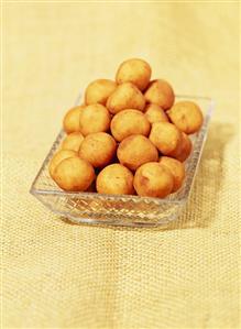 Marzipan potatoes in glass dish