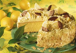 Lemon butter cream cake with flaked almonds
