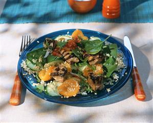 Bulgur wheat salad with grilled lamb, spinach and apricots