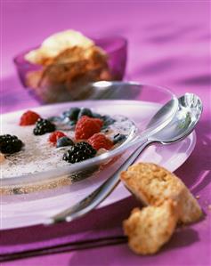 Lemon grass and champagne soup with berries and cantuccini