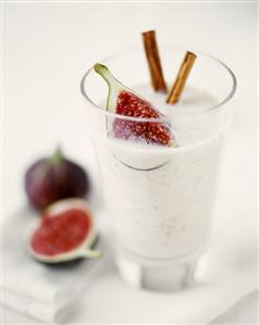 Buttermilk with figs and sea buckthorn and cinnamon sticks