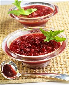 Raspberry jelly with mint leaves