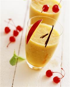 Mango shake with vanilla and cocktail cherries