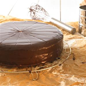 Sacher torte on cake rack