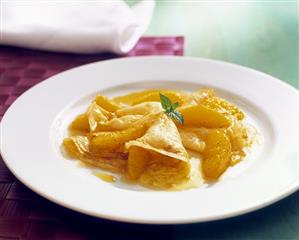 Crepes with orange segments