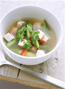 Miso soup with green asparagus, peppers and tofu