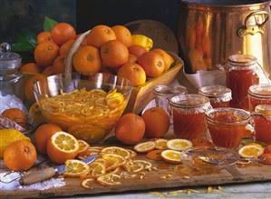 Orange marmalade in jars, Seville oranges, orange slices