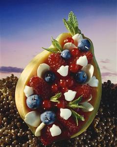 A Papaya Filled with Berries and Cream