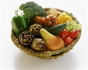 Fruit and vegetables in wicker basket