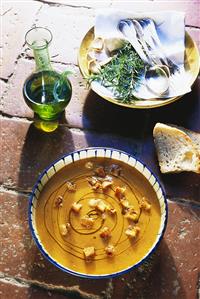 Pumpkin soup with pumpkin seed oil and croutons