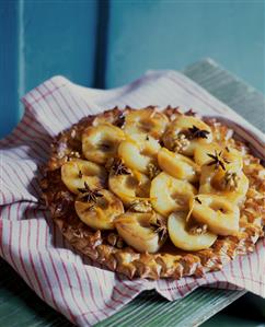 Pear tart with walnut and star anise