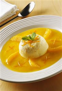 Orange quark mousse on orange sauce