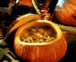 Pumpkin and meat soup in a hollowed out pumpkin (Tanzania)