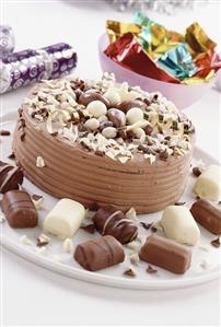 A chocolate gateau and chocolates