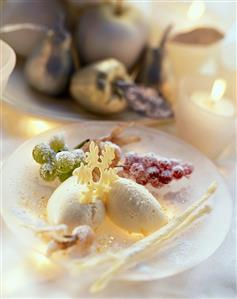 White mousse au chocolat with frosted fruit