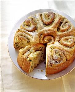 Apple rose cake (coiled bun round) with ginger, piece cut (1)