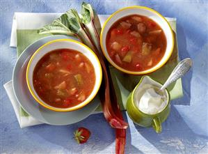 Stewed rhubarb and strawberries, with cream