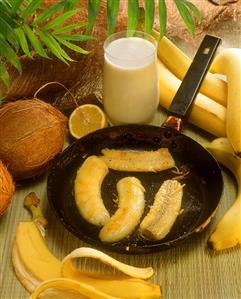 Fried bananas in the pan, with banana milk