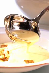 Cheese soup with black bread croutons