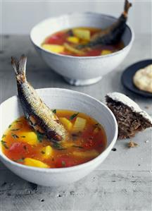 Fish soup with fried sardine