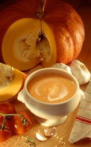 Cream of pumpkin and tomato soup with garlic