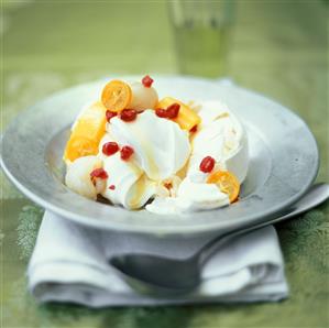 Lime ice cream garnished with exotic fruits