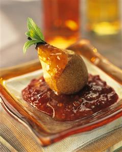 Baked pears on berry sauce