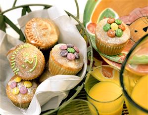 Lemon muffins with coloured chocolate buttons (1)