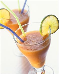 Two glasses of peach and lime drink