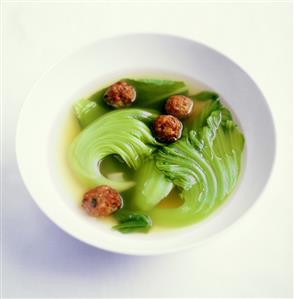 Pak choi with tofu balls in broth