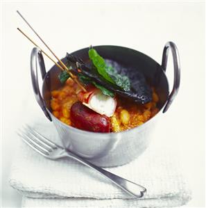 Bean stew with sausage and chard