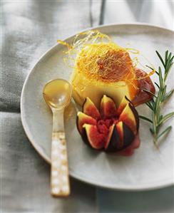 Rosemary panna cotta with caramel strands and fig