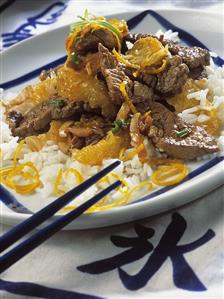 Beef with oranges on rice