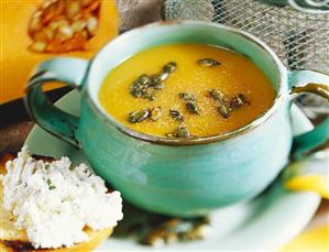 Cold cream of pumpkin soup, with toast and herb quark