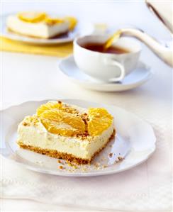 Tray-baked orange cheesecake; tea