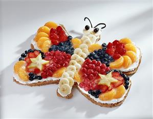 Fruit cake in shape of a butterfly for child's birthday.  Receta disponible TR