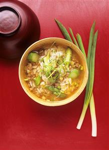 Rice soup with green asparagus and mince