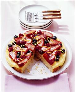 Lemon quark cake with fruit, a piece taken