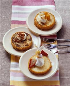 Slices of three different cakes, baked in jars